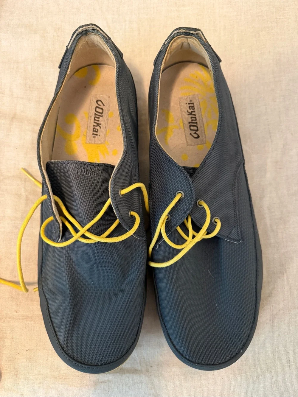 OluKai Men's Navy Canvas Boat Shoes with Yellow Laces